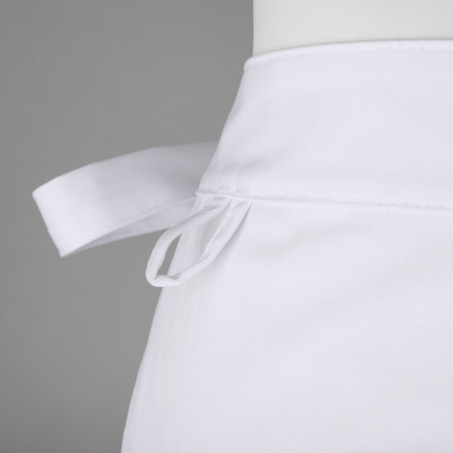 CONCEPT Halbschürze Detail